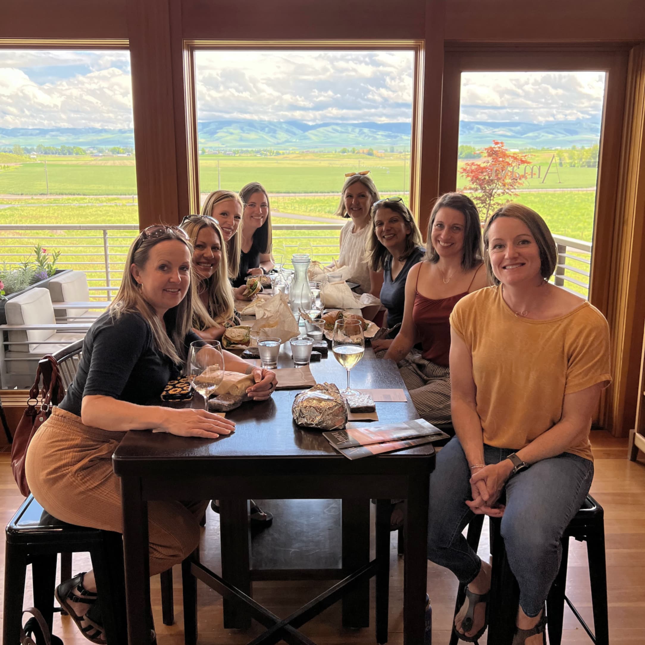 A group mid-tasting at an estate winery out in the valley
